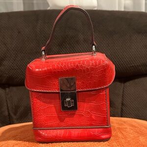 CARLOS SANTANA MINI RED PURSE